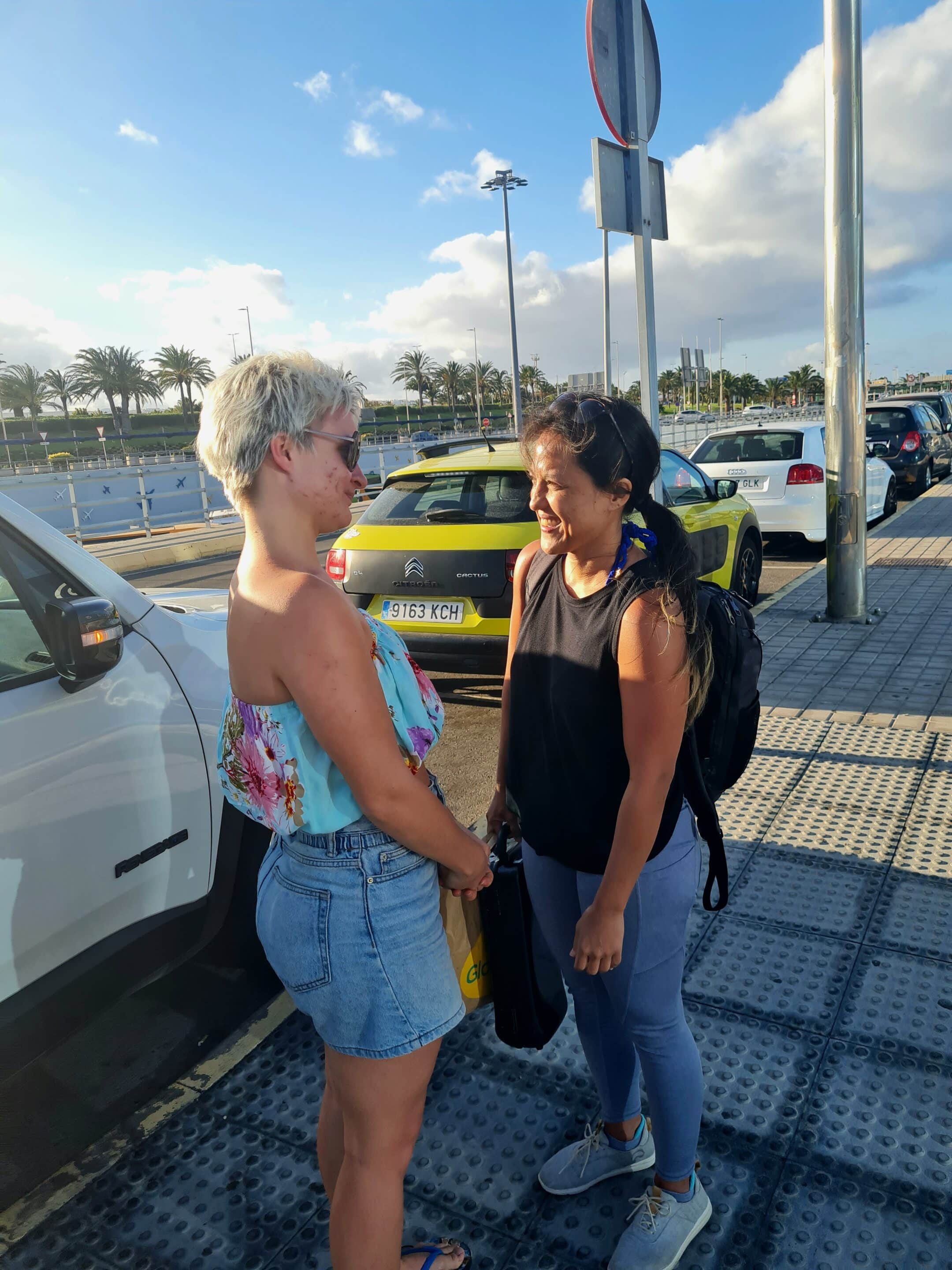 two women looking at each other affectionately.